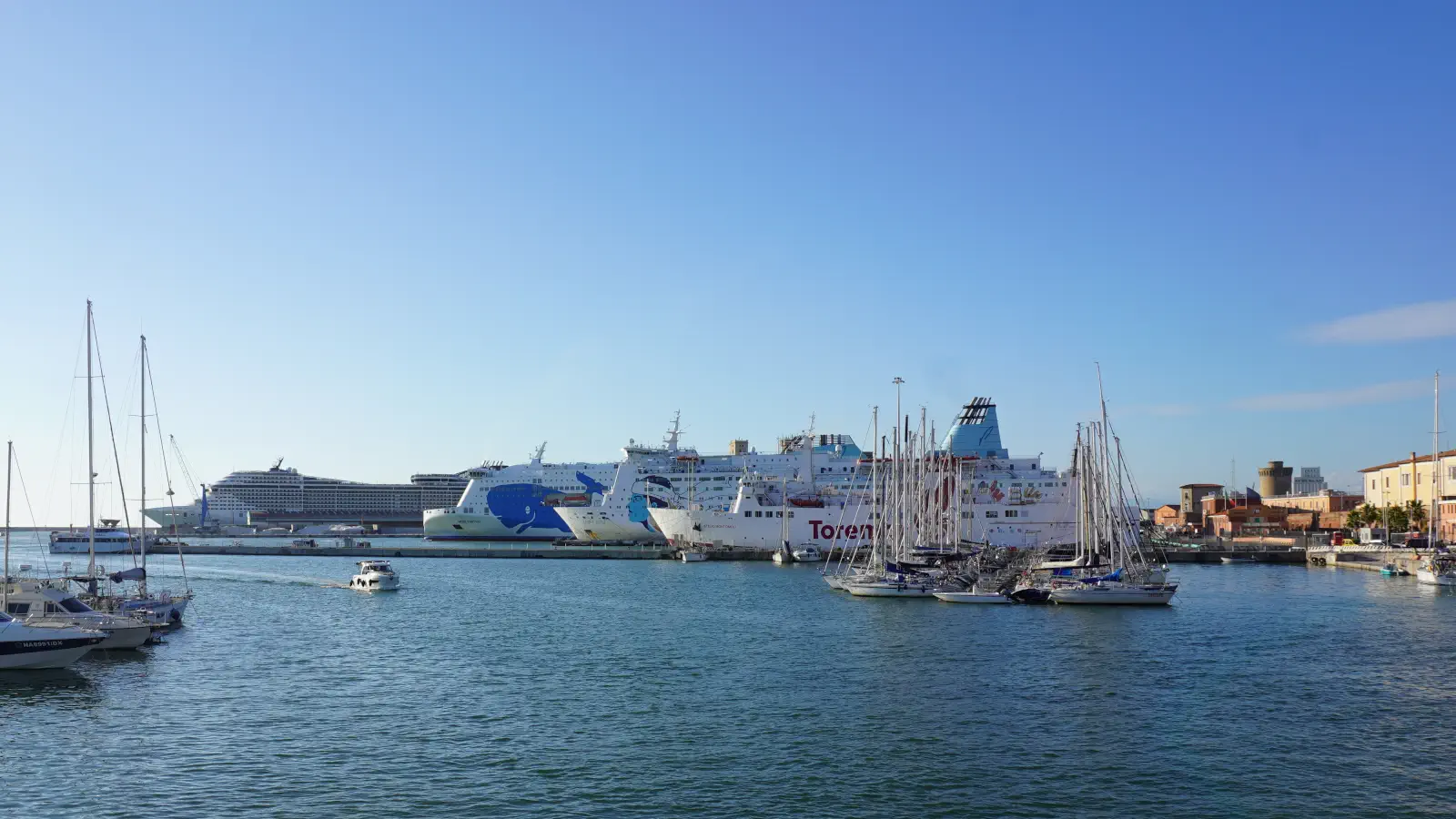 Ferries from Moby Lines and Toremar in the port of Livorno.